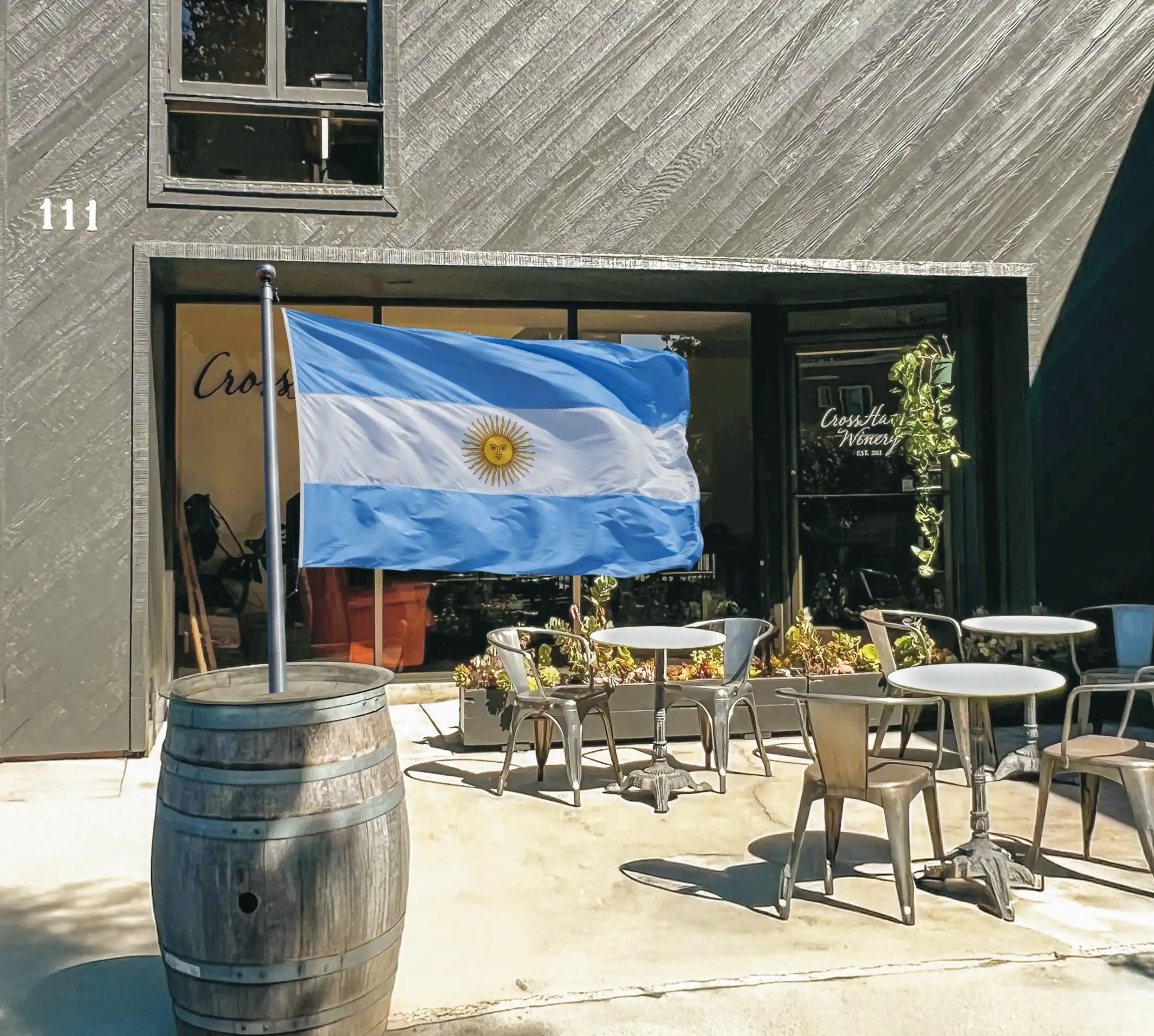 Crosshatch winery with an Argentine flag out front.